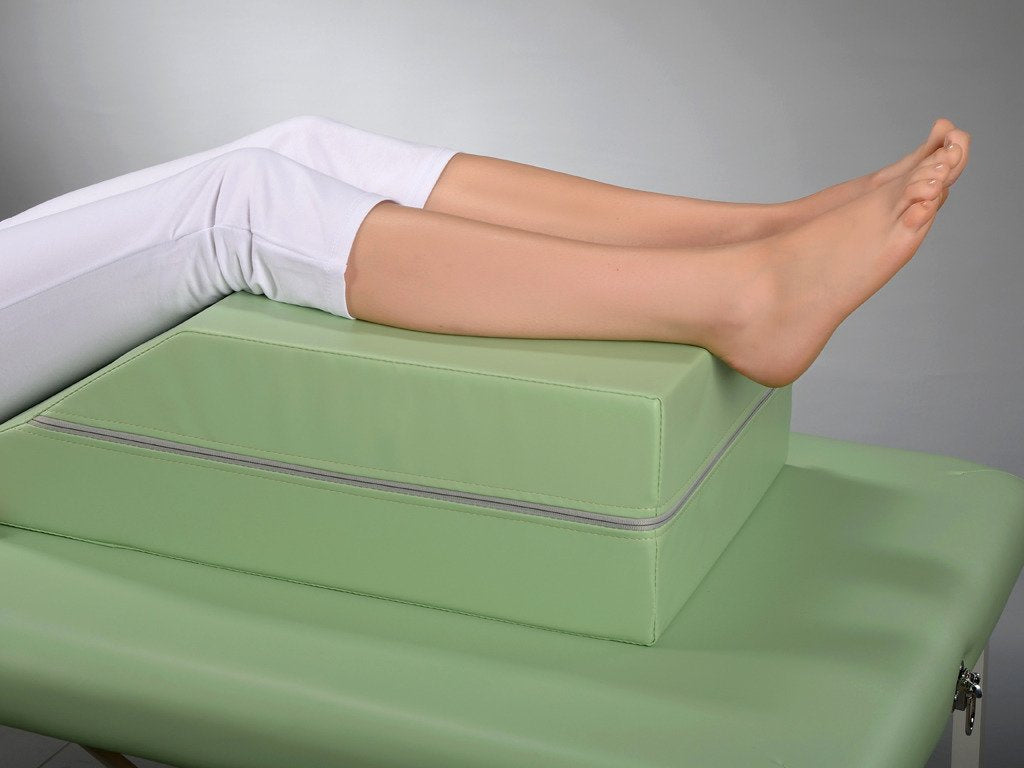 Lagerungskeil für die unteren Extremitäten während der Bauchmassage | 70/40x40x20 | Polsterung Vinyl Flex